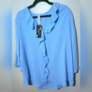 Blooming Talents light blue ruffle V-neck long sleeve blouse.
